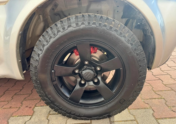 Suzuki Jimny cena 33900 przebieg: 166000, rok produkcji 2011 z Radomsko małe 497